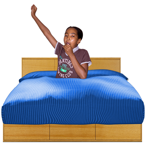 teenage girl yawning in bed